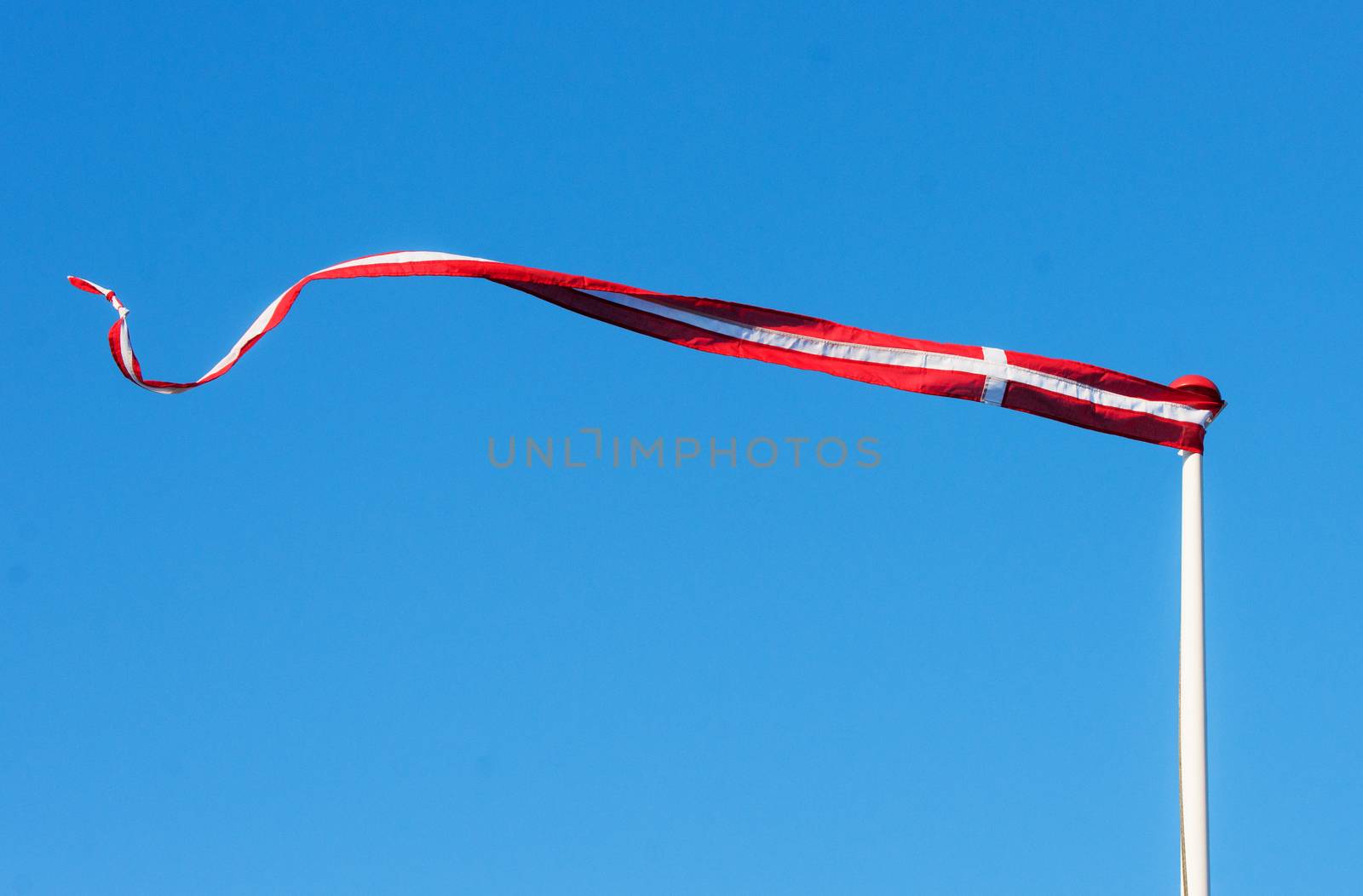 Pennant with the flag of Denmark blowing in the wind by Sportactive