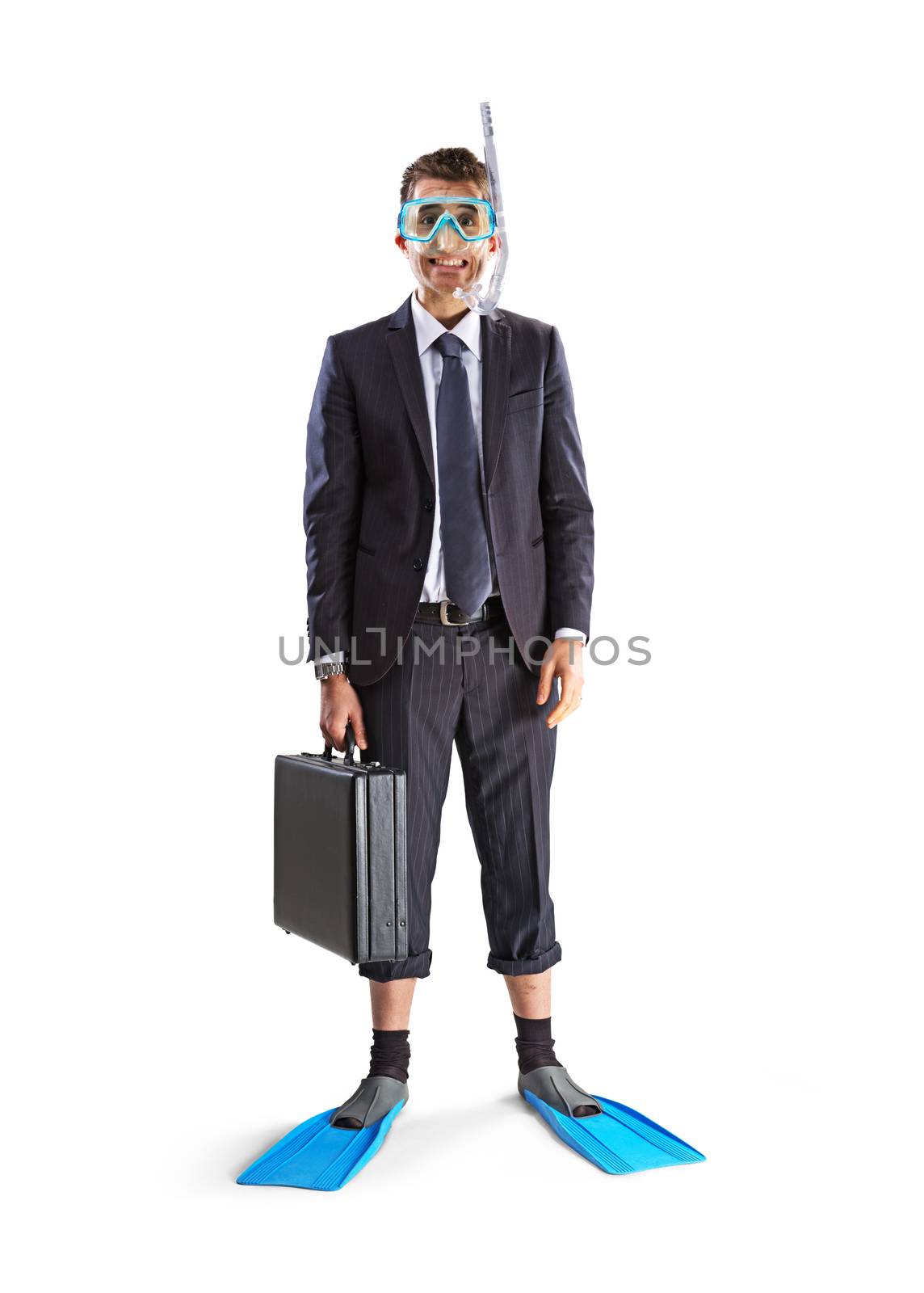 Smiling businessman with scuba mask and diving flippers holding a briefcase on white background.