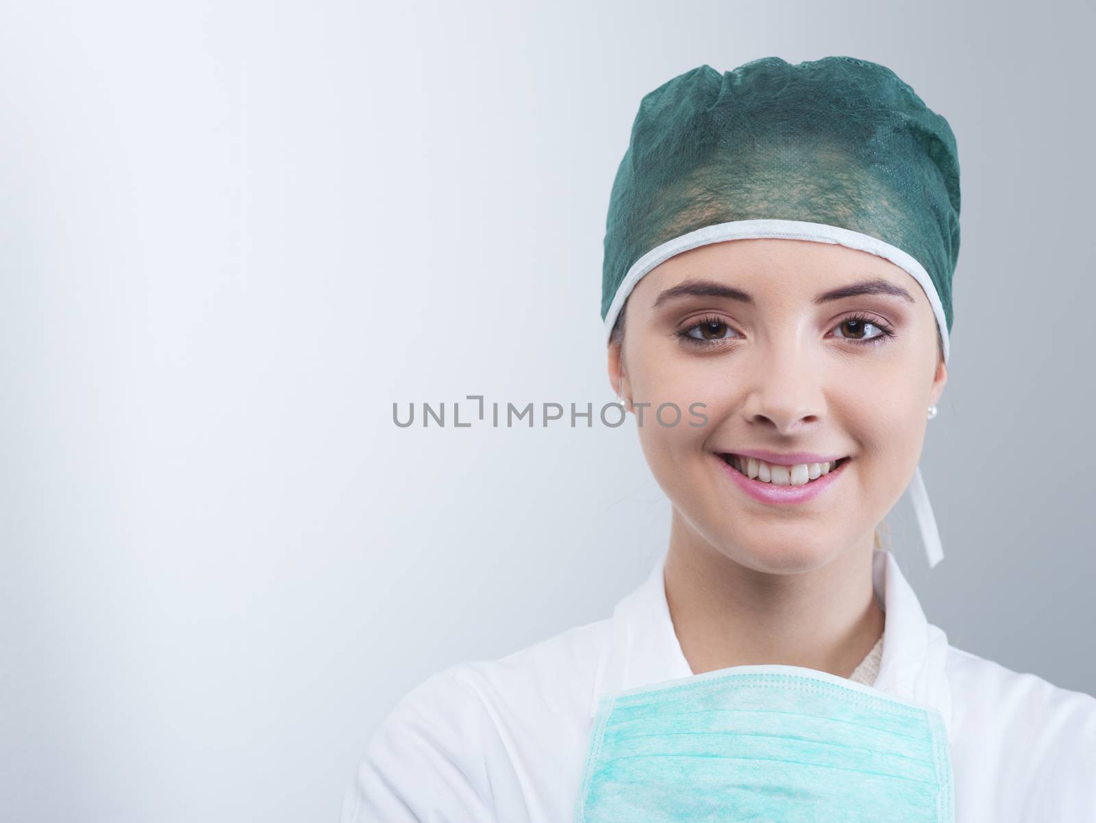 Portrait of a young beautiful female surgeon