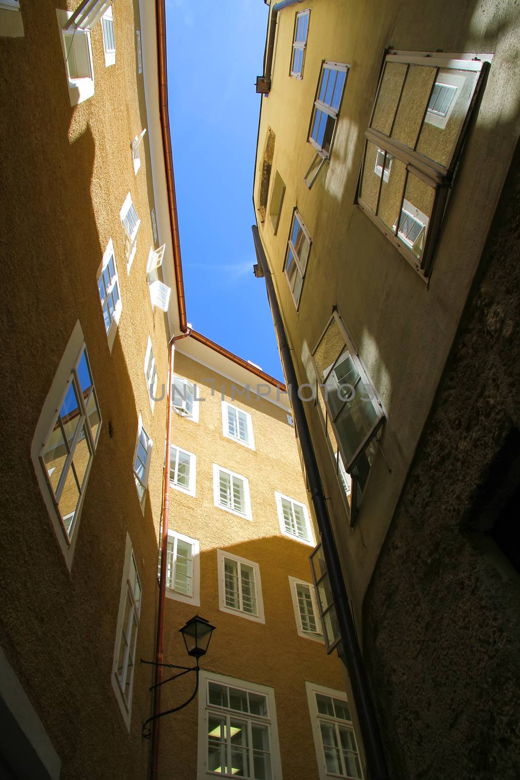 In between historic architecture in Salzburg, Austria, Europe.