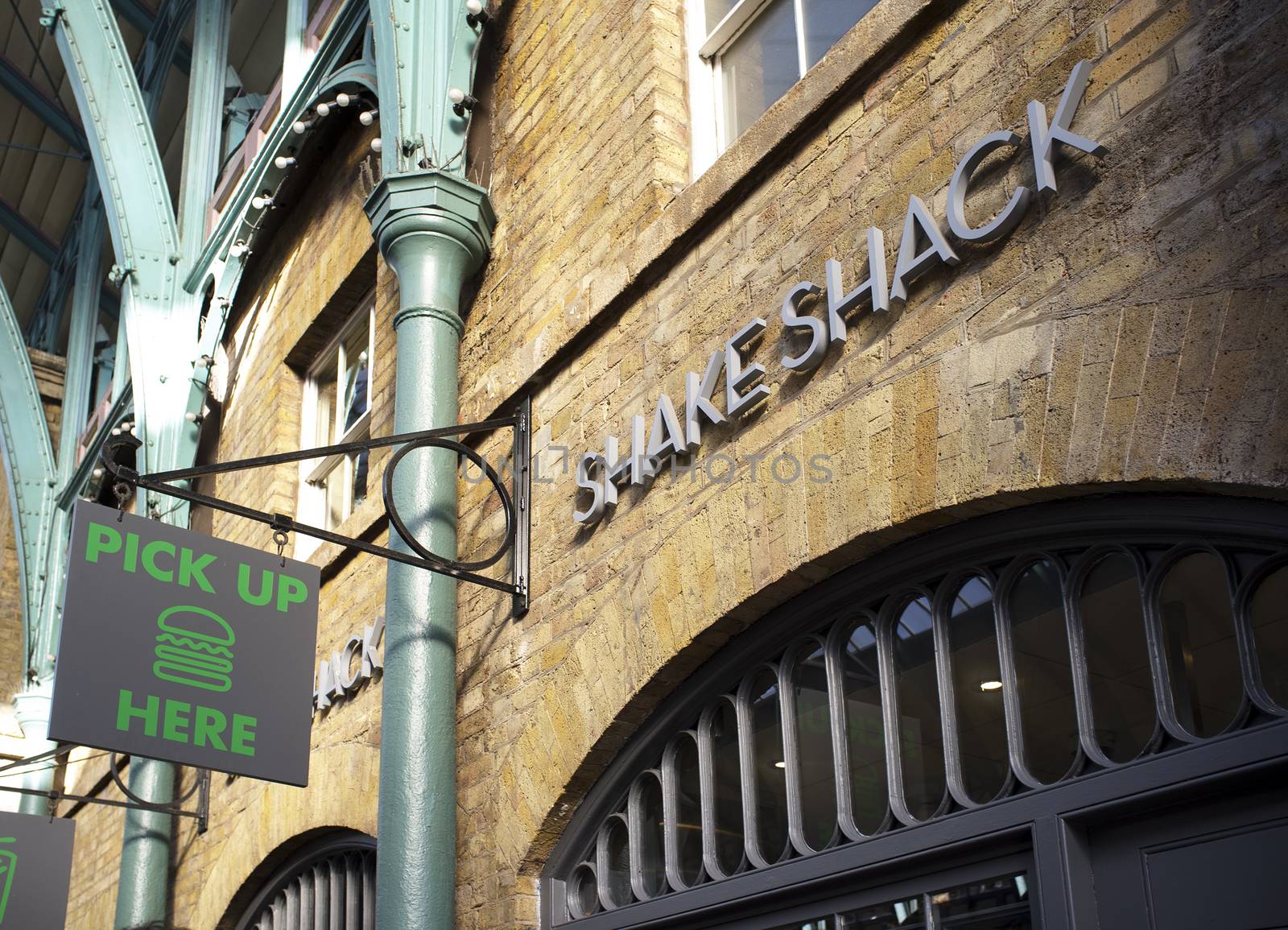 LONDON, UK – APRIL 16, 2014: LONDON, UK – APRIL 16, 2014: The first Shake Shack fast food restaurant in the UK, Covent Garden, London.