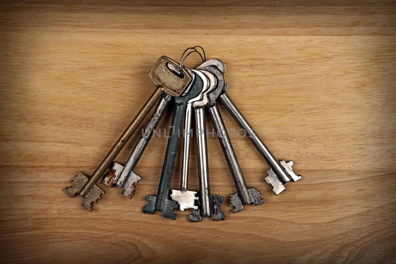 Old Keys on the Wooden Background