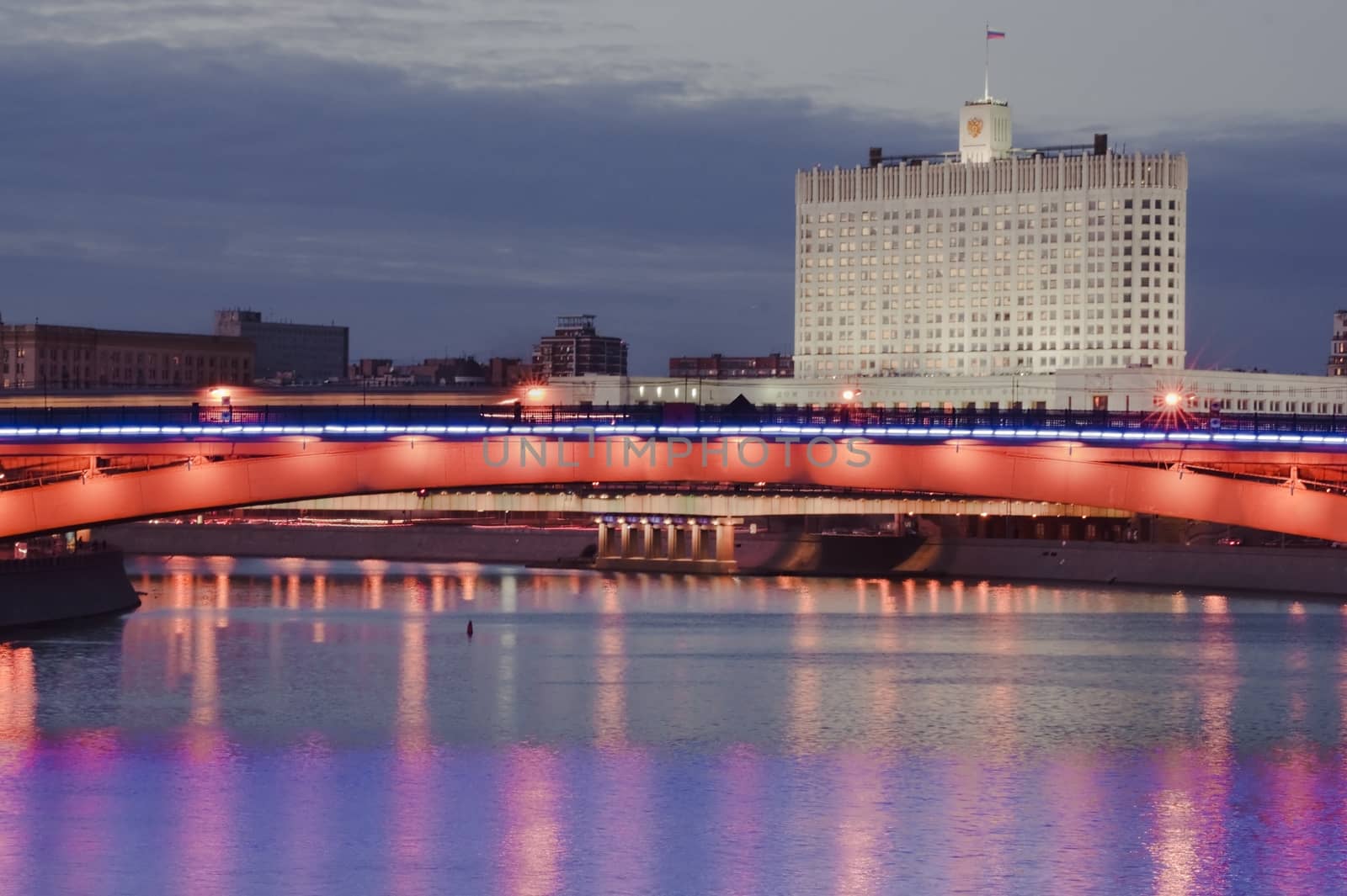 Government building Russian Federation and Moscow river at night