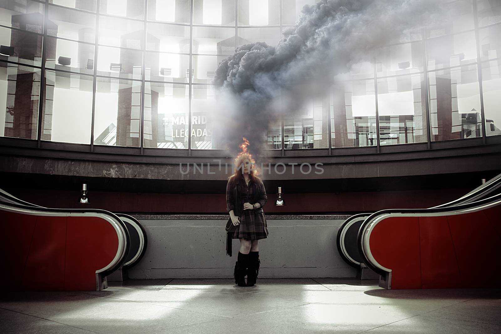 Sad, girl on fire in a train station, over time, risk by FernandoCortes