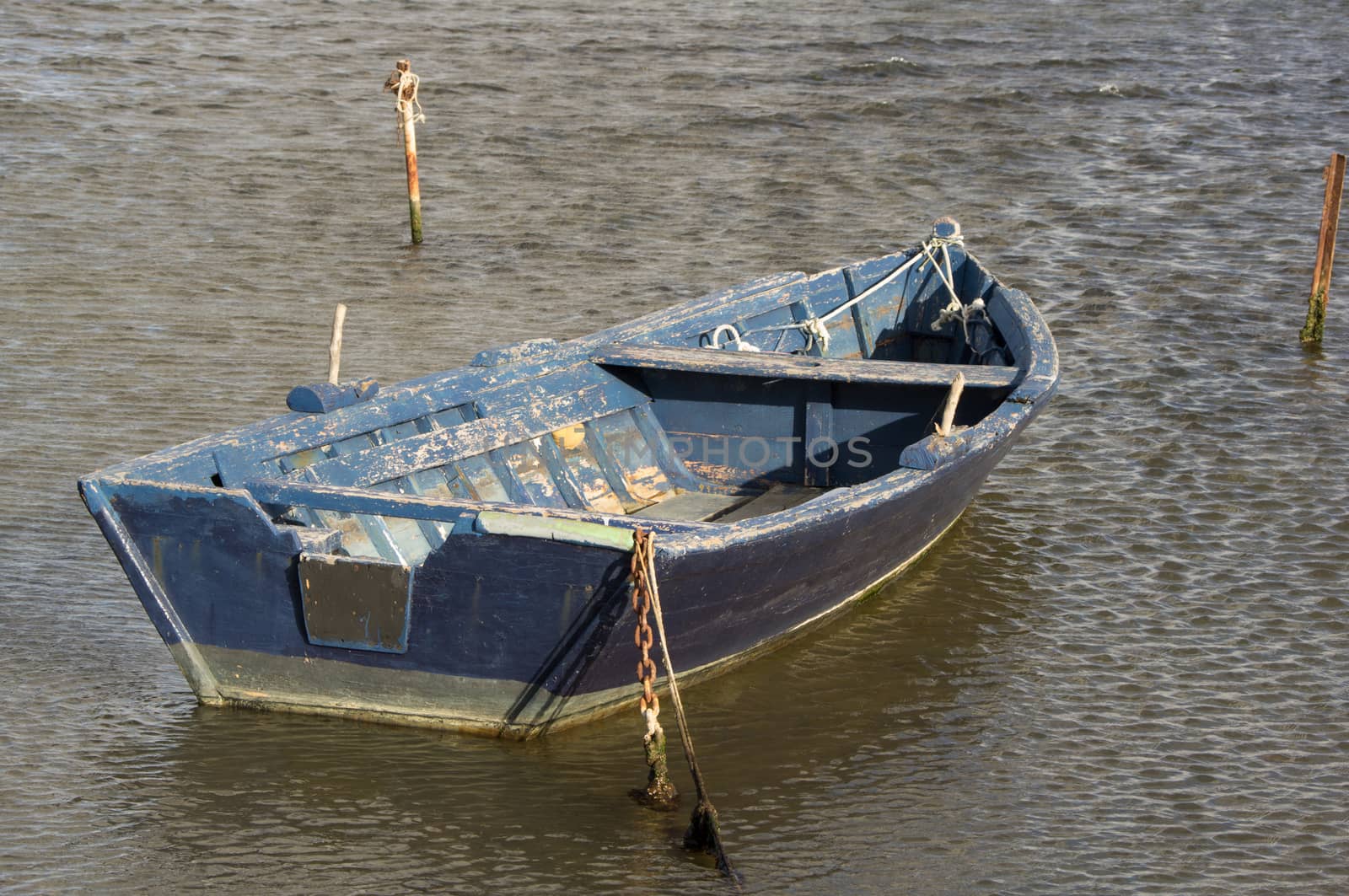 Fishing boat anchored in the pond
