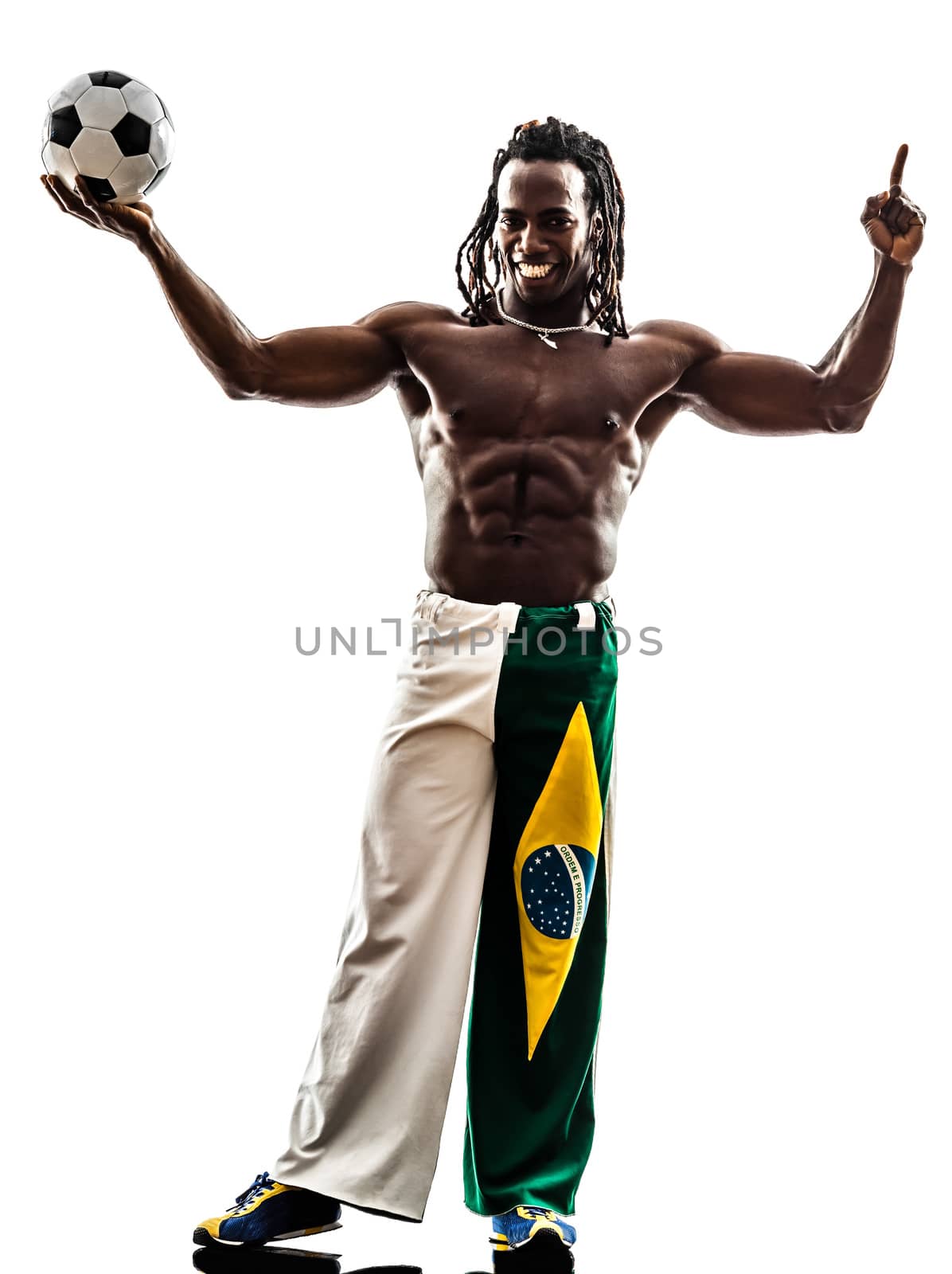 one Brazilian black man soccer player holding showing football on white background