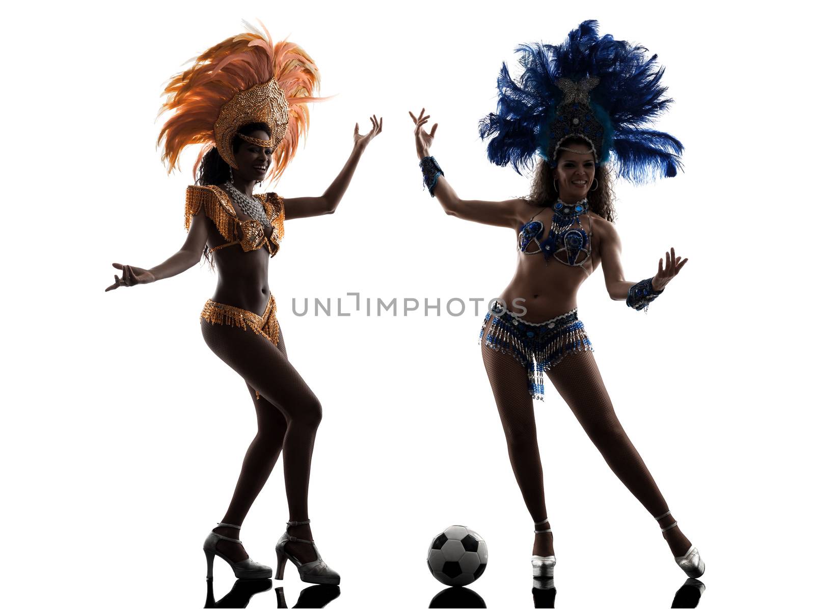 two women samba dancer playing soccer silhouette on white background