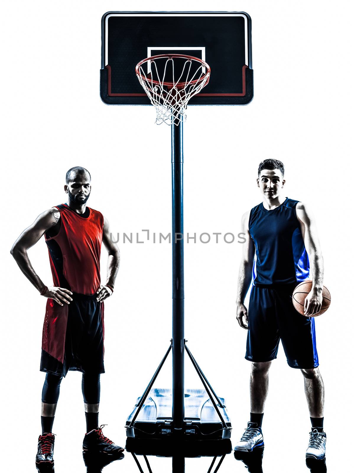 two men basketball players holding ball in silhouette isolated white background