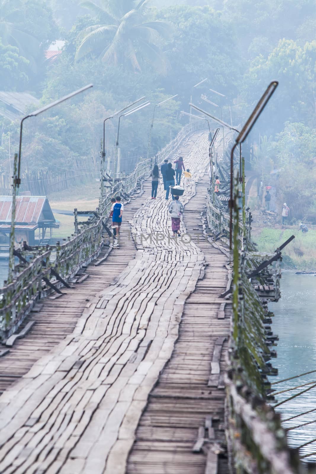 Wooden bridge in the fog on the way Chavit.