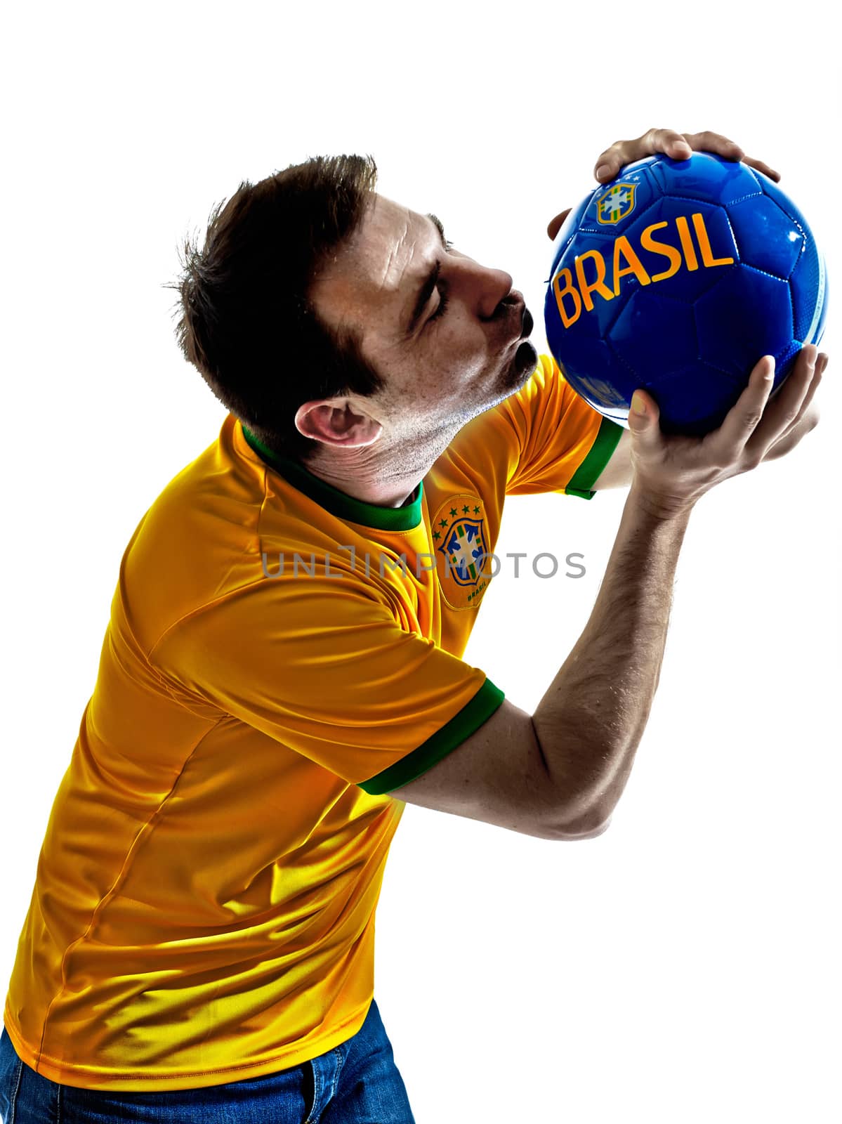 man Brazilian Brazil kissing soccer ball  by PIXSTILL