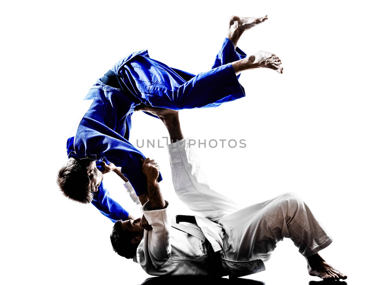 two judokas fighters fighting men in silhouettes on white background