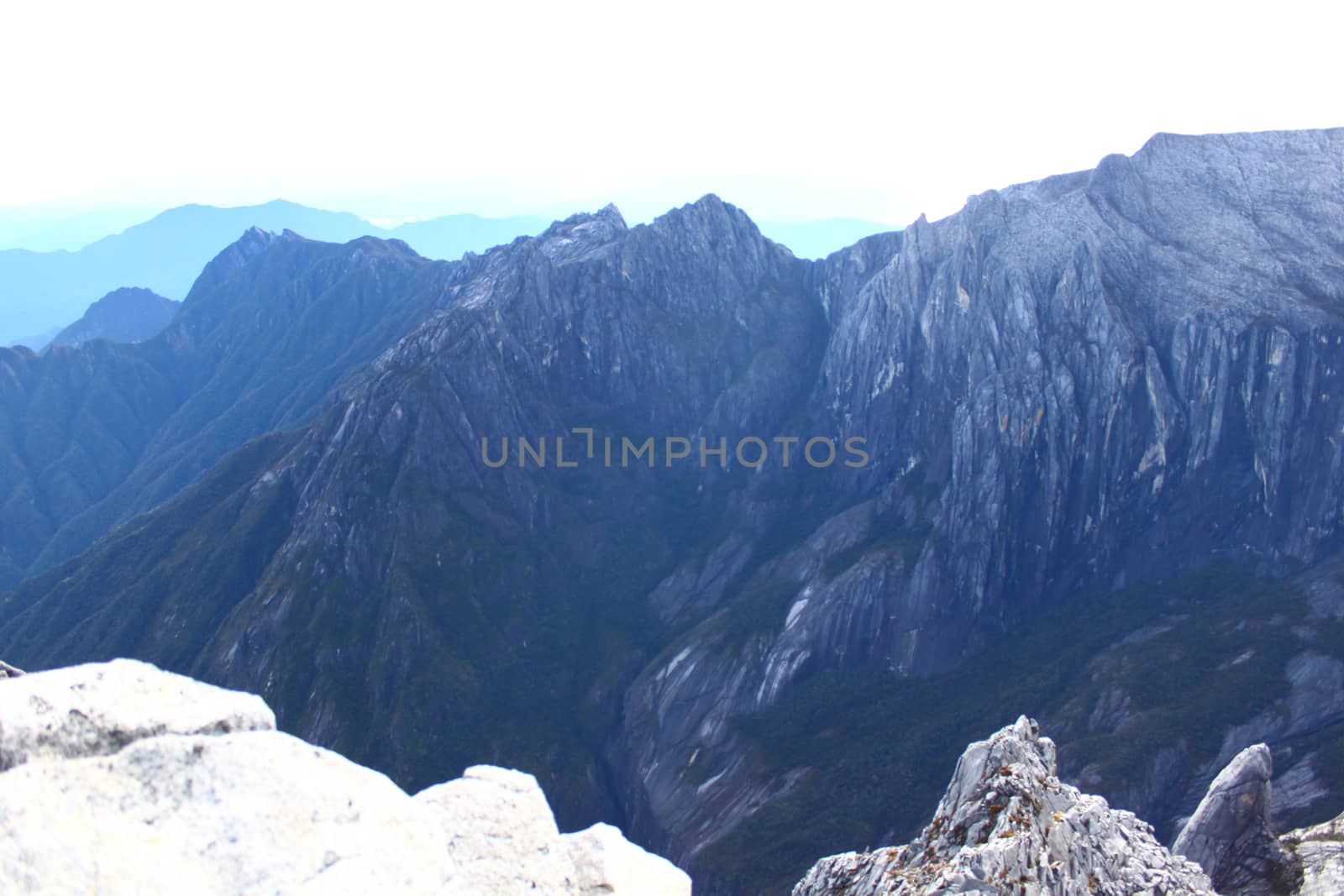 mountain climbing in kota kinabalu national park by sorayuth26