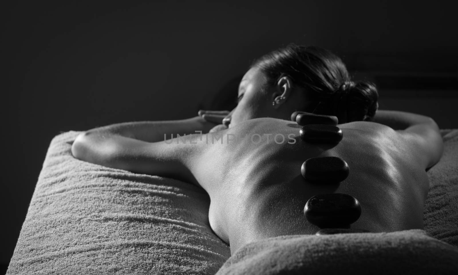 Hot stone massage at spa by stokkete