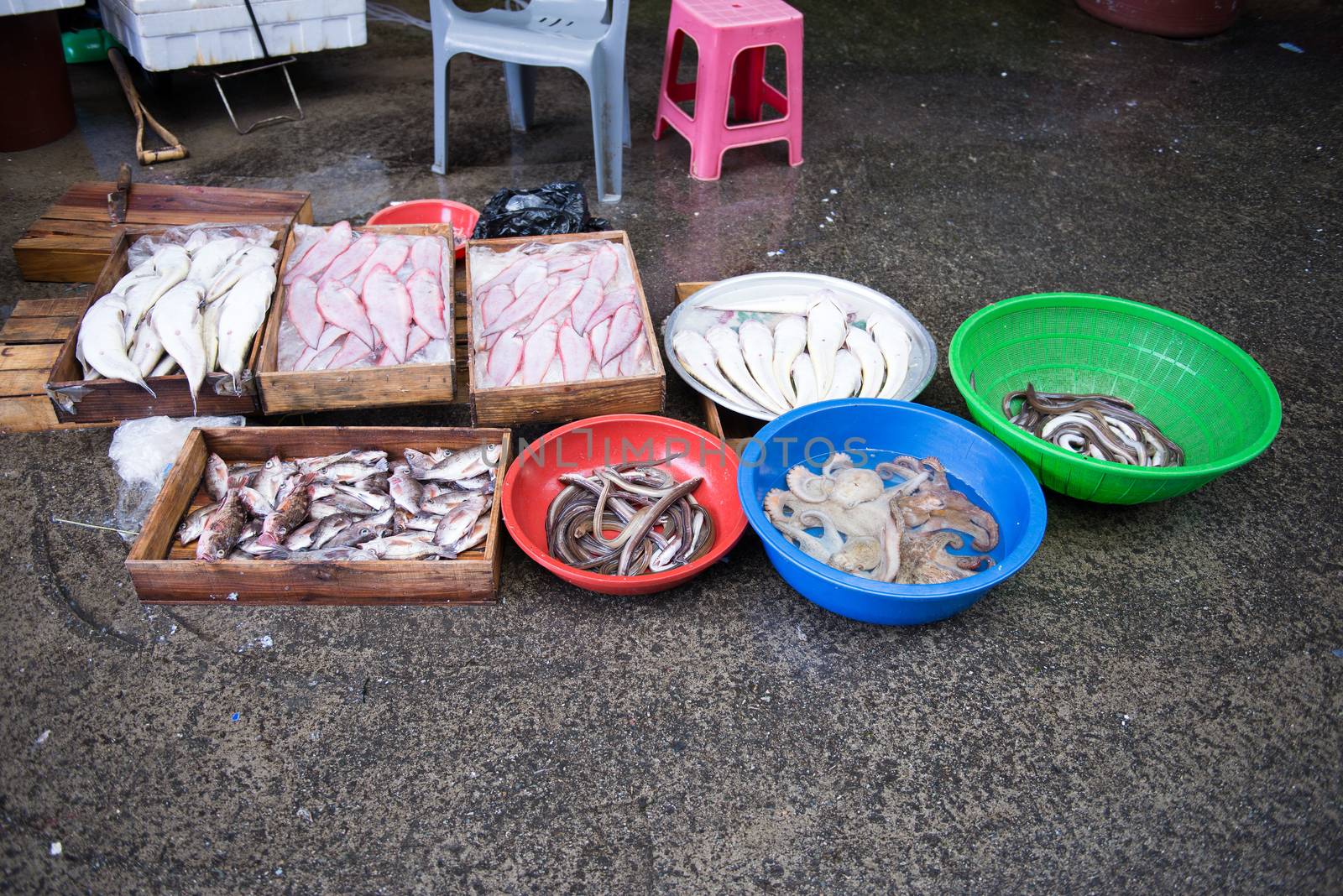 Local fish market in Yeosu, South Korea with fresh fish and sea food on ice