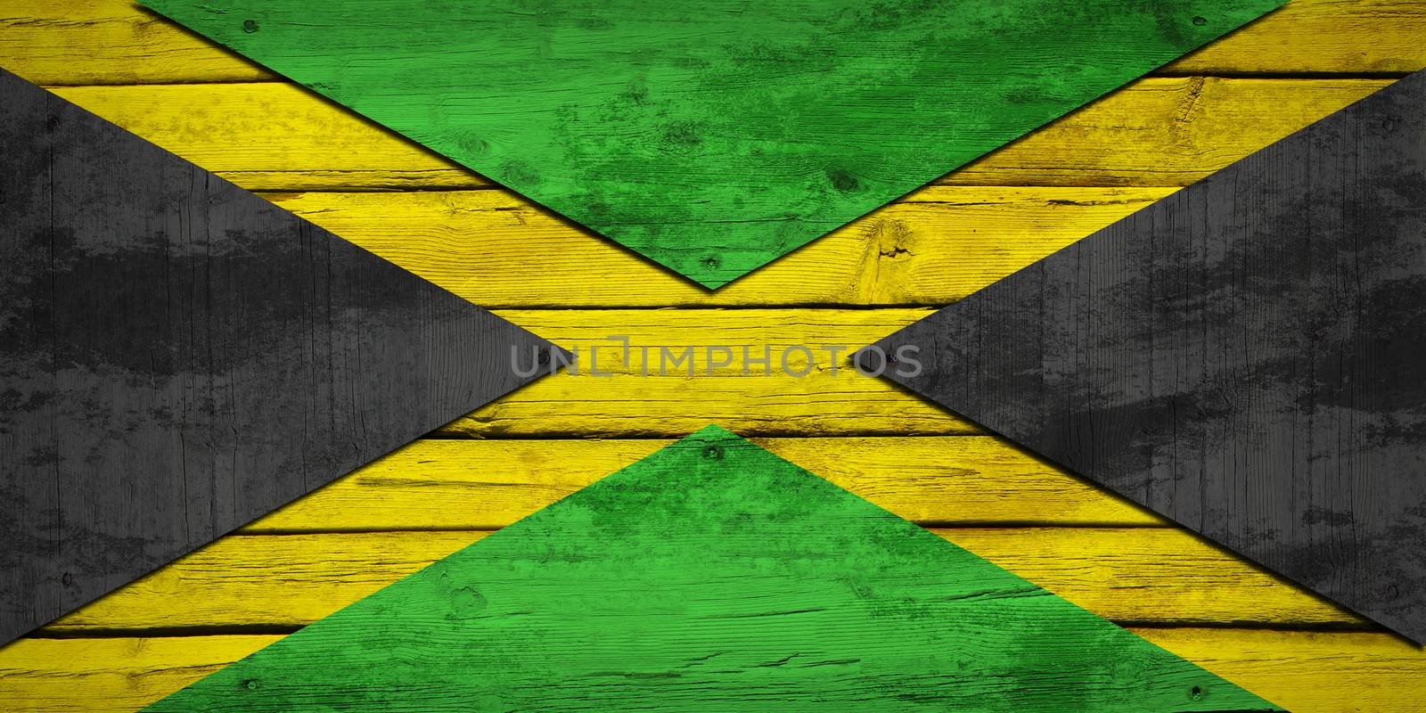 Jamaican flag painted on wooden boards. Grunge style