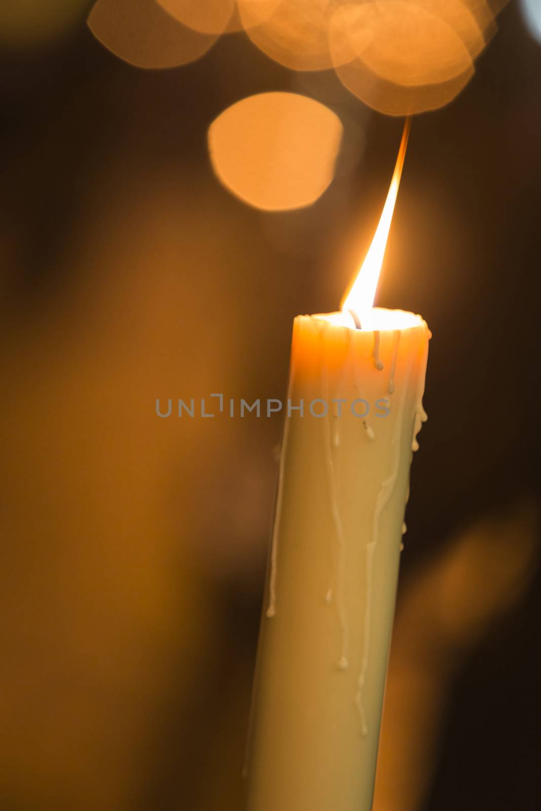 Candle light with light bokeh in the background