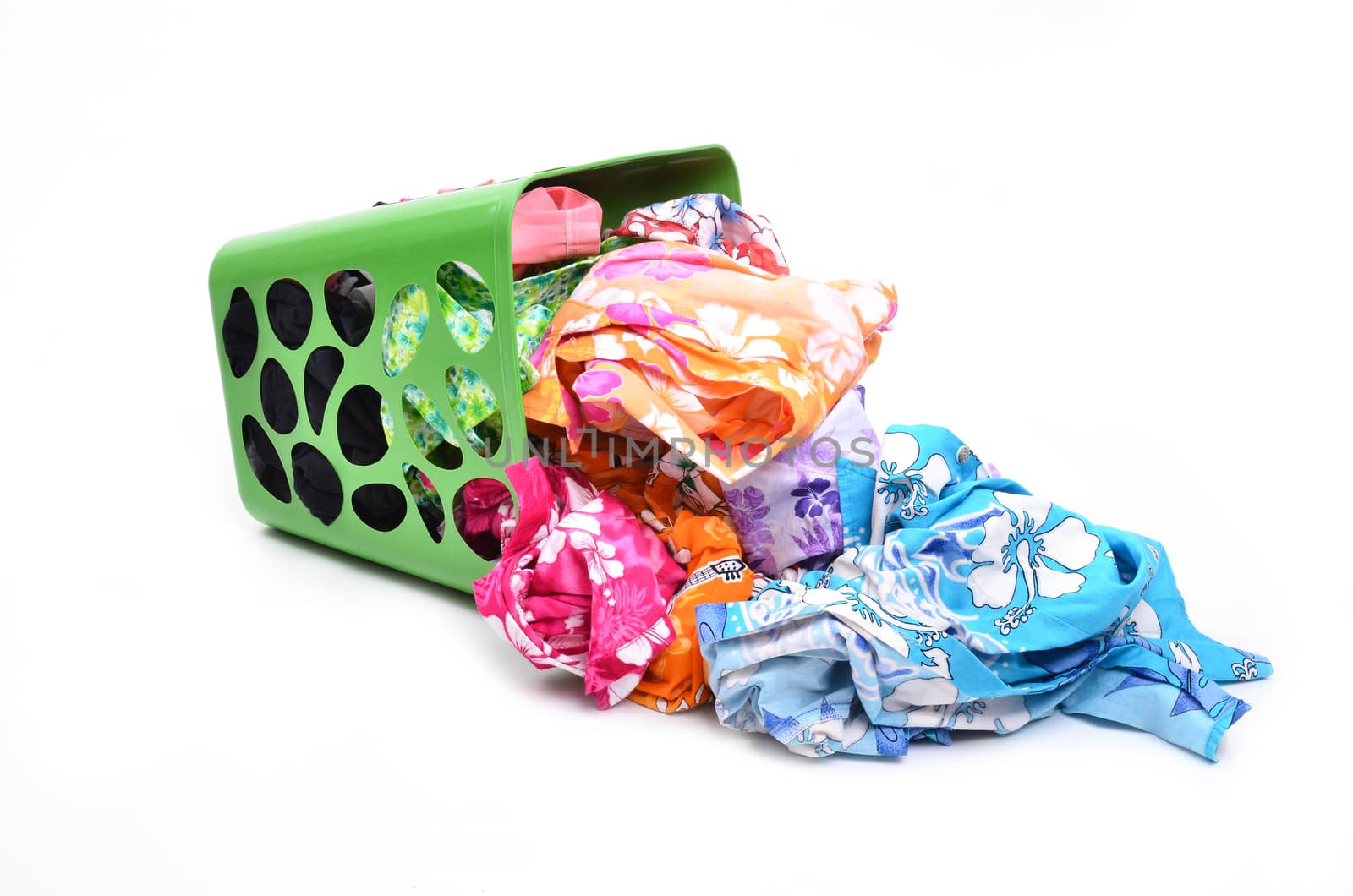 unwashed cloth in the basket on white background
