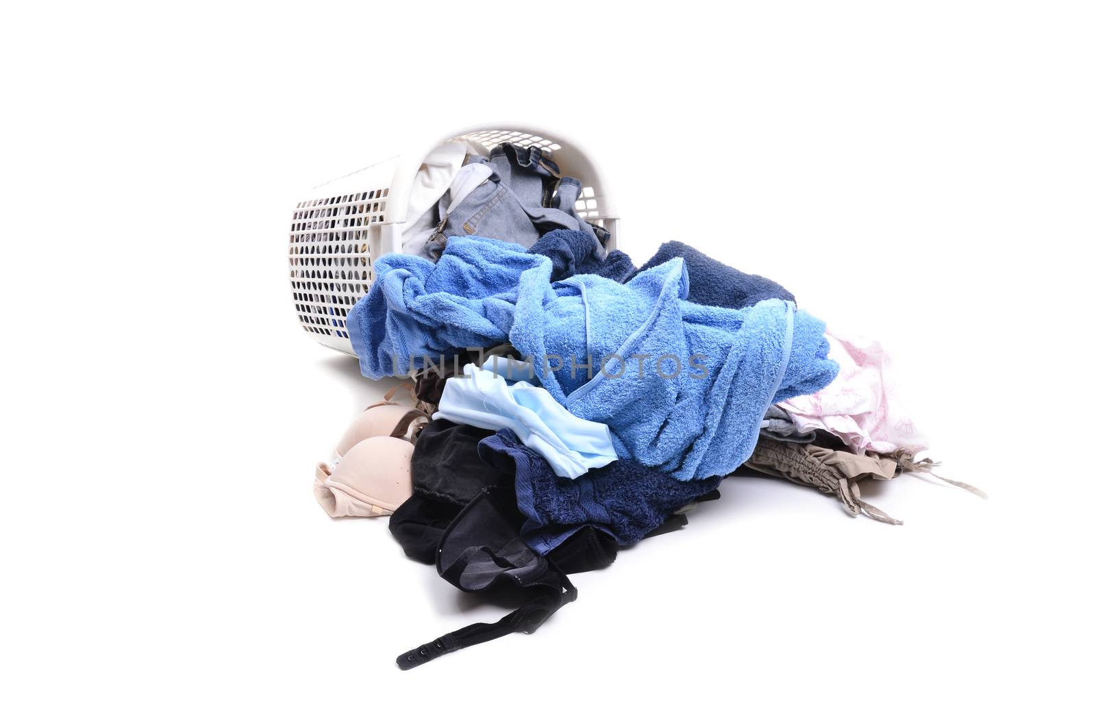 unwashed cloth in the basket on white background