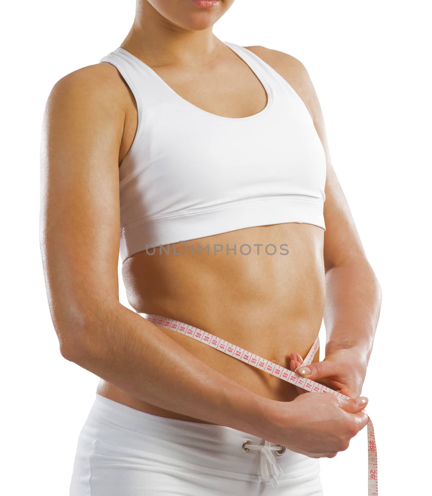 young athletic woman measuring waist measuring tape, isolated on white background