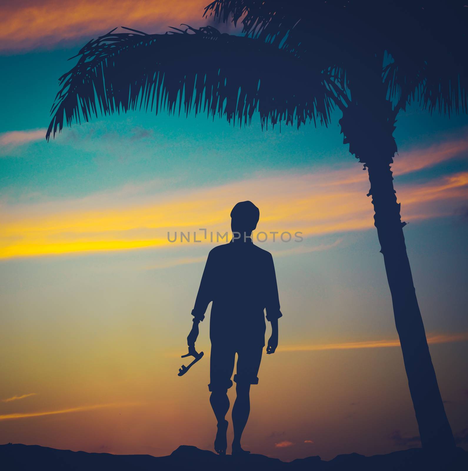 Retro Vintage Filtered Photo Of A Man Strolling On A Beach In Hawaii With Palm Tree At Sunset
