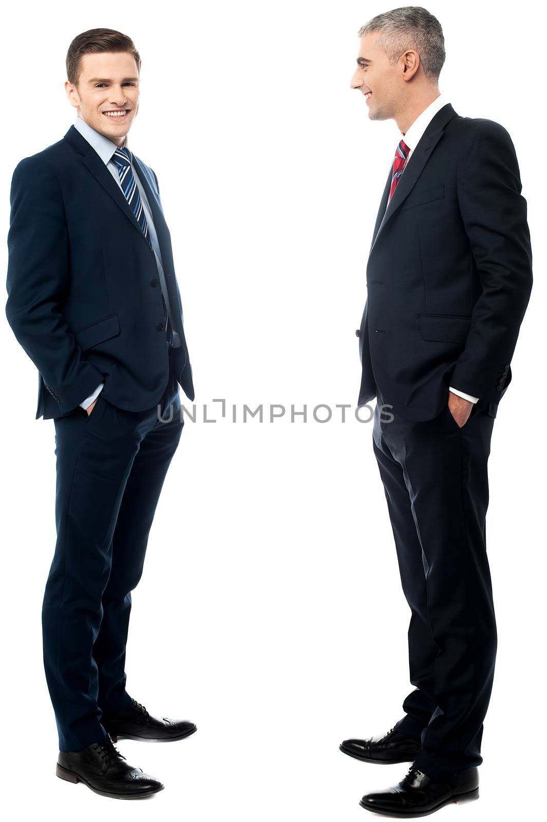 Two Businessmen standing on a white background