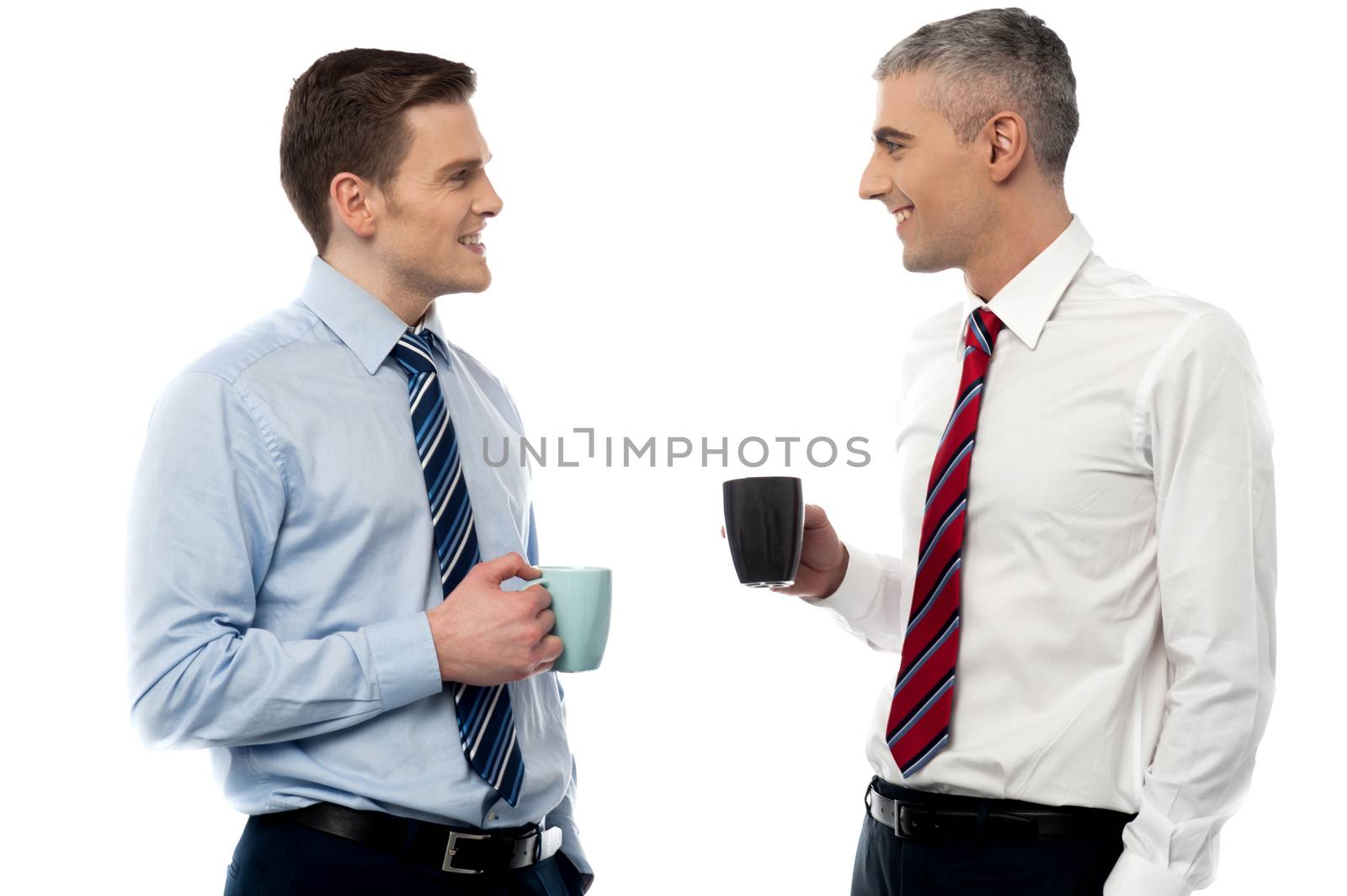 New corporate partners toasting coffee by stockyimages