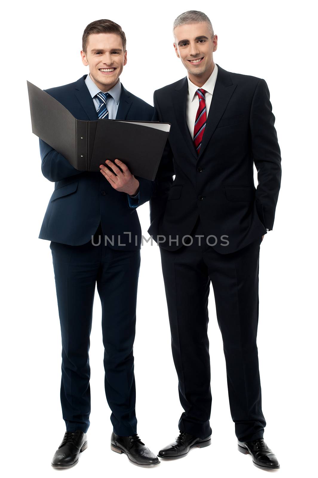 Two businesspeople reviewing their business documents