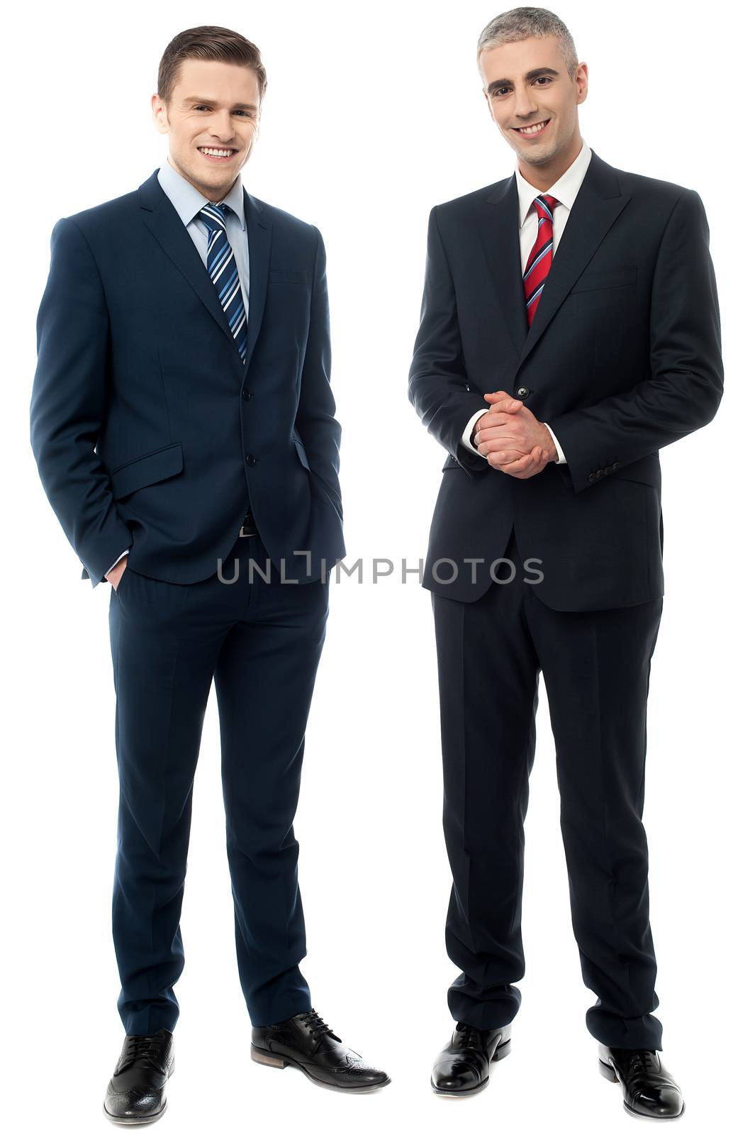 Business people posing in style by stockyimages