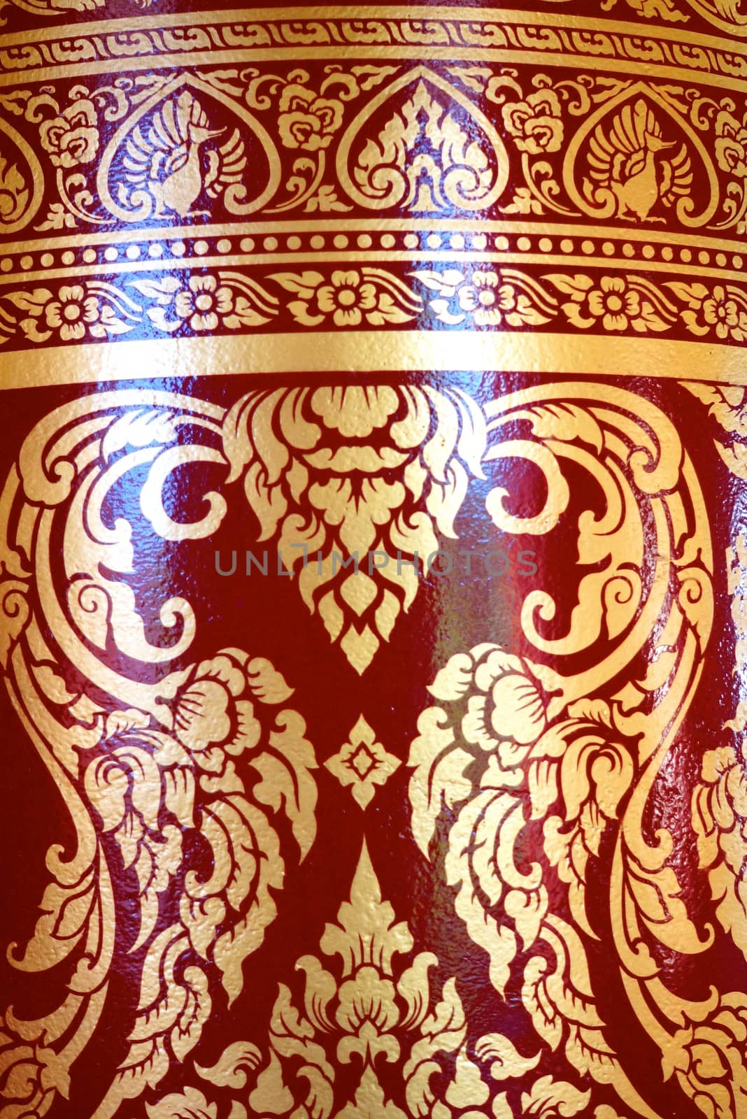 various of thai patterns on temple wall and pillars that  usually present in red,black and gold colour