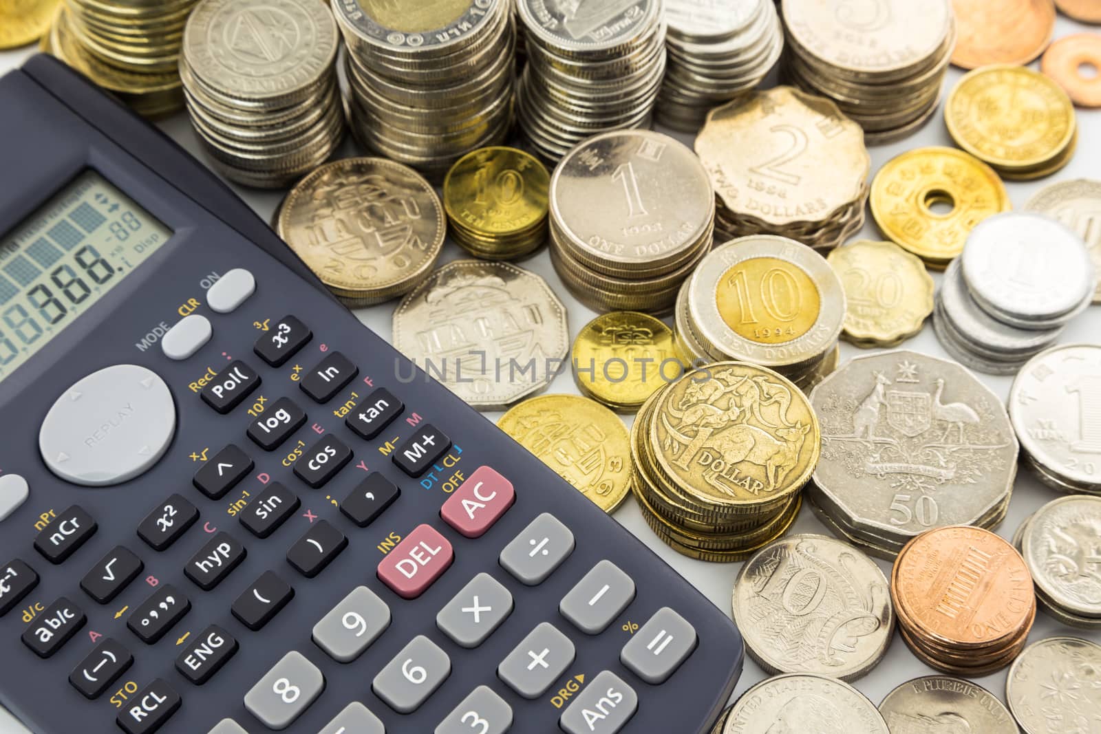 world currency coins and calculator by vinnstock