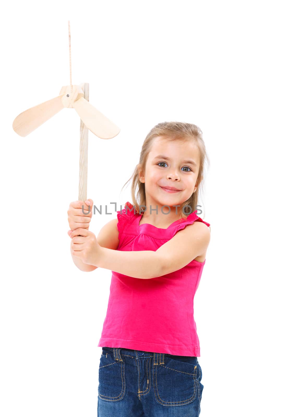 Education, childhood and ecology concept - smiling girl with wooden windmill toy.