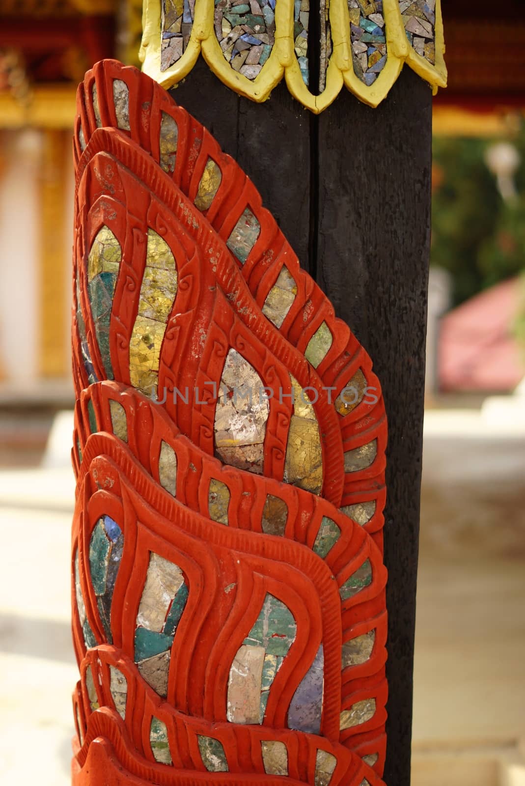 ancient stucco work that decorated with mirror and precious stone,Lampang temple,Thailand