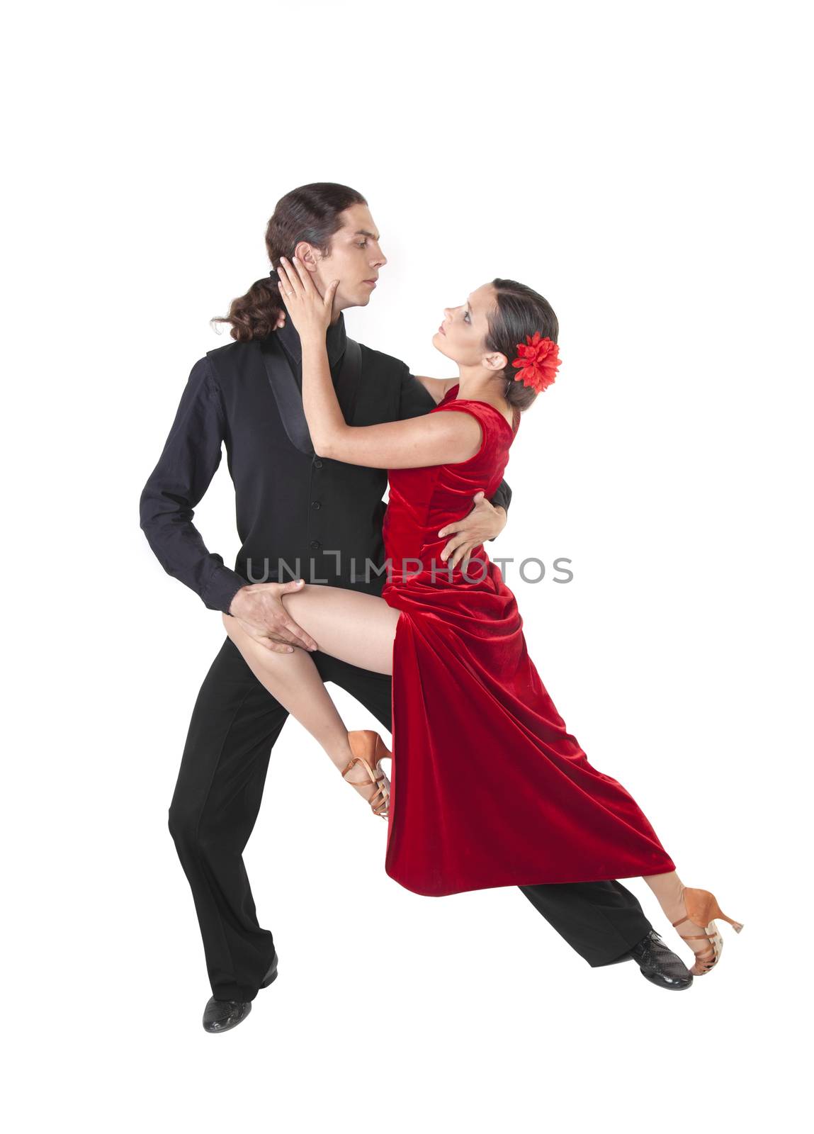 Young couple dancing tango isolated over white