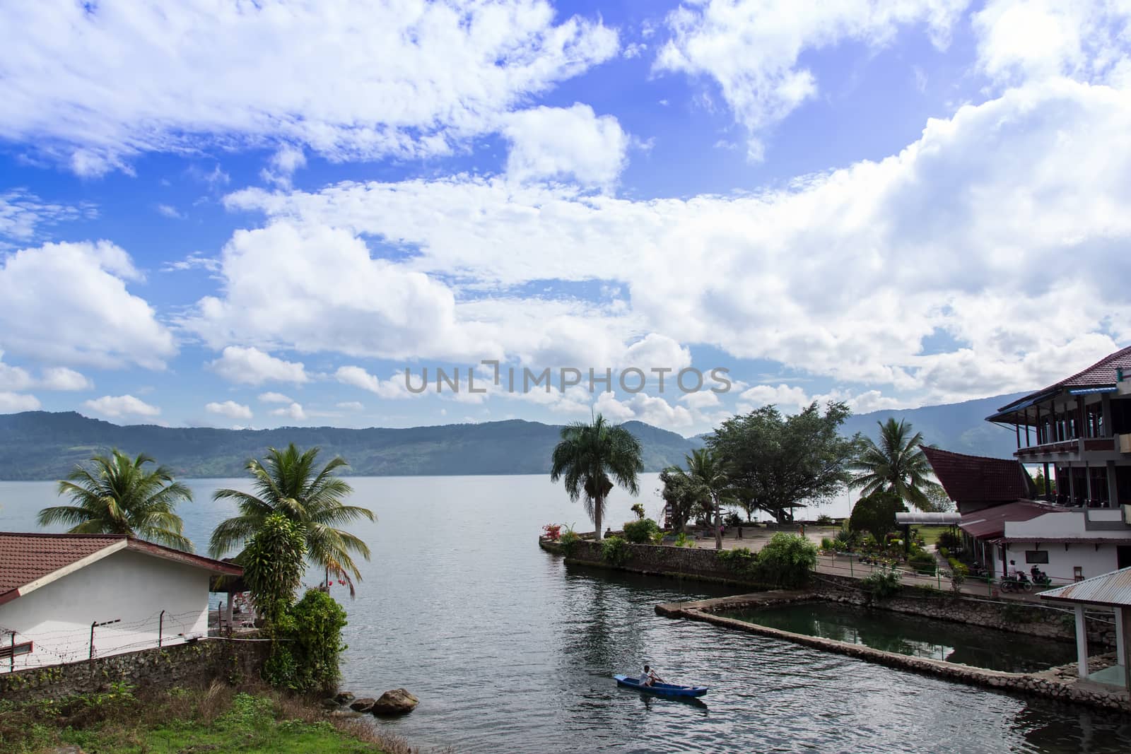 Small Boat and Lake Toba. Samosir Island North Sumatra, Indonesia. EDITORIAL.