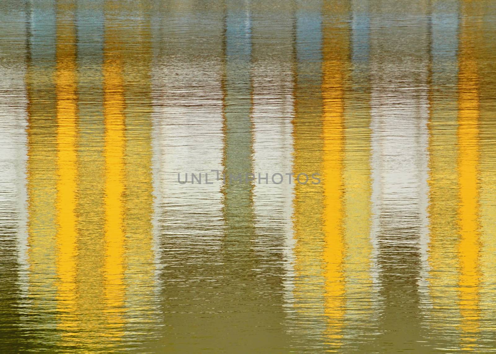 background or texture yellow mirroring on the water