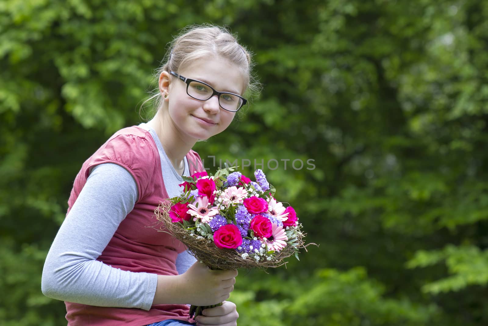 portrait of a beautiful young girl with flowers by miradrozdowski