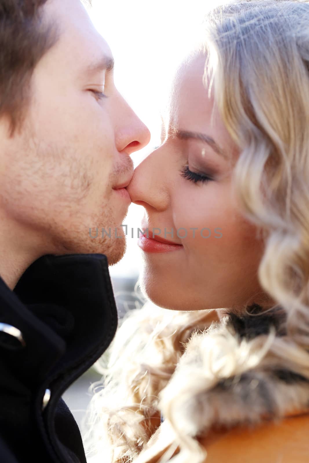 Autumn. Cute couple in the park