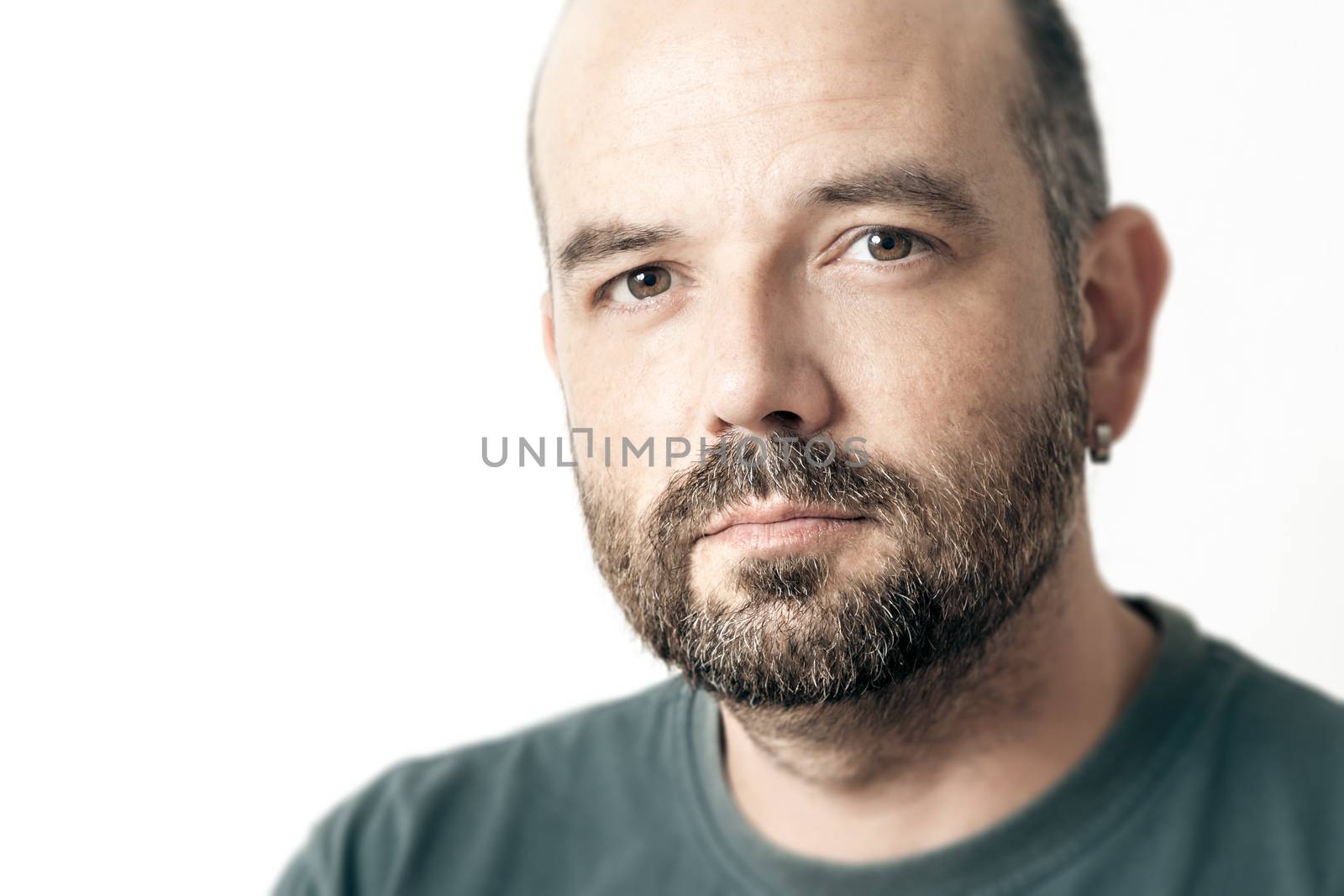 A handsome man with a beard isolated on white background