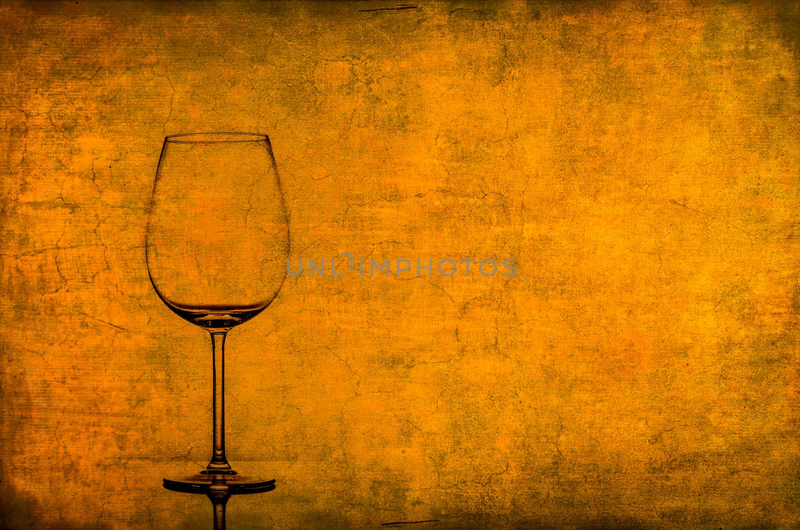 Empty wine glass on nice vintage texture by martinm303