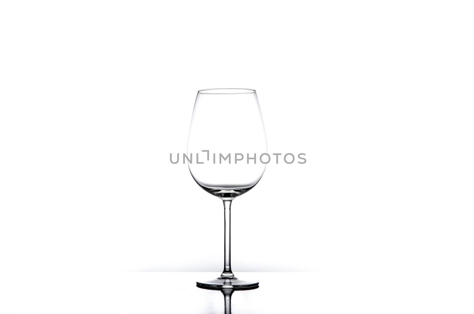 Empty wine glass isolated on white background by martinm303