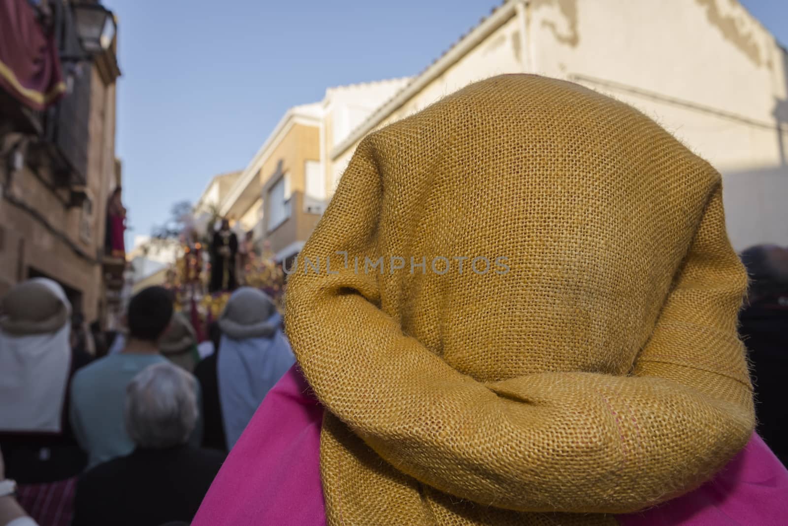 Linares, Jaen province, SPAIN - March 17, 2014: Group of costaleros during a procession of holy week, taken in Linares, Jaen province, Andalusia, Spain