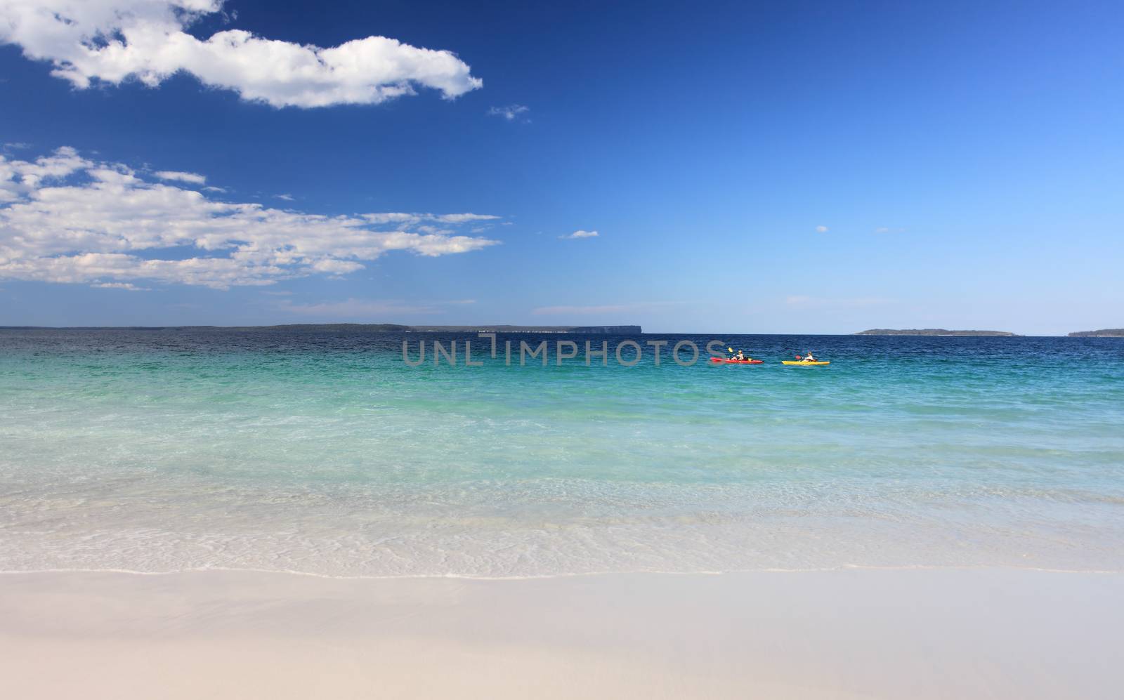 Crystal clear waters of an Australian beach at Jervis Bay NSW Australia. Space for your message