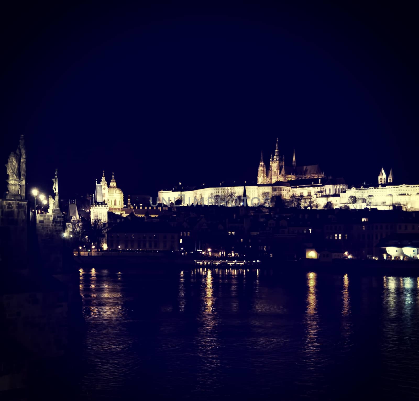 View of the Castle in Prague at night. blue toning by Zhukow