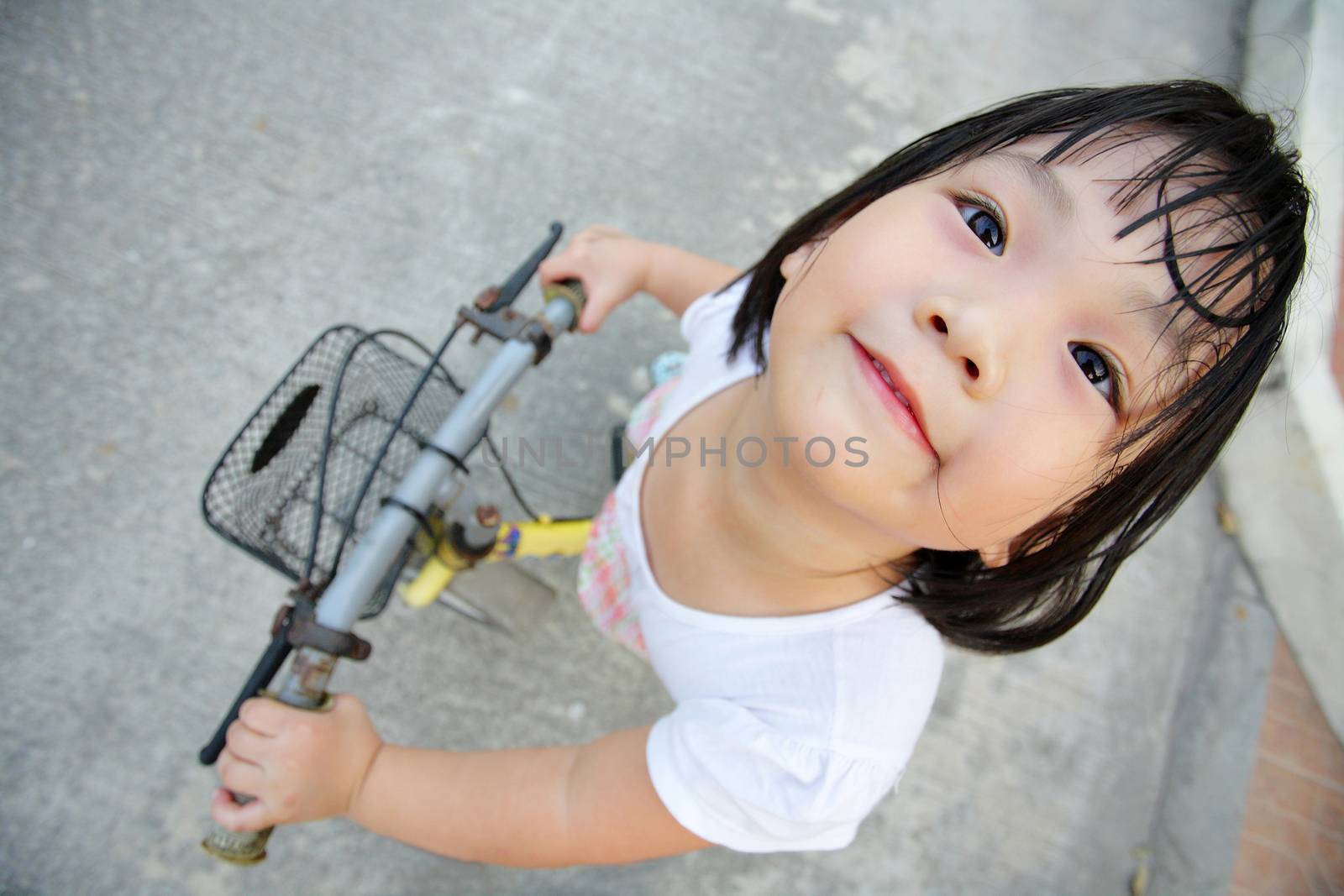 Asian girl cycling