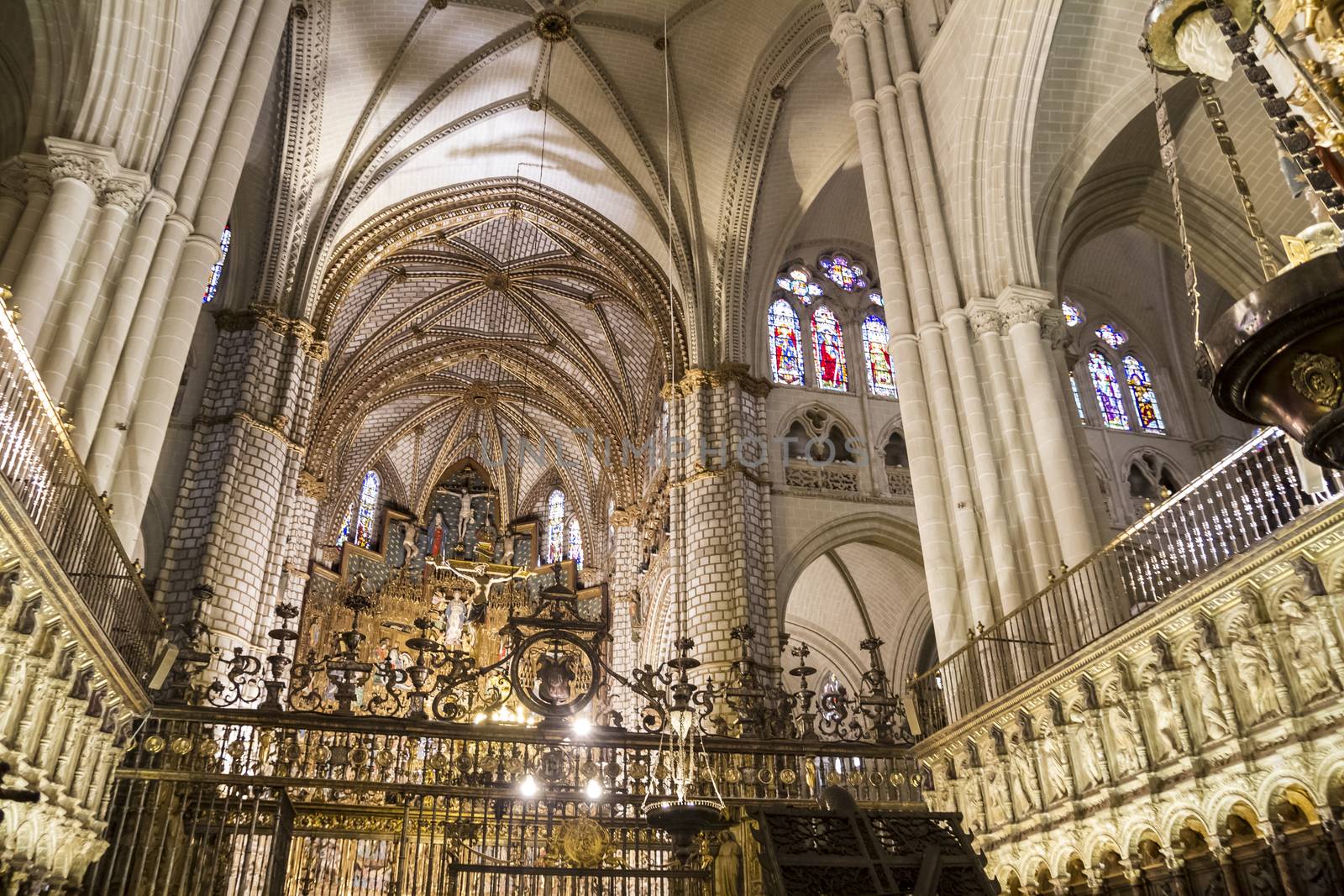 Interior of Toledo Cathedral. Arcs, organ, columns and gothic art. Spain