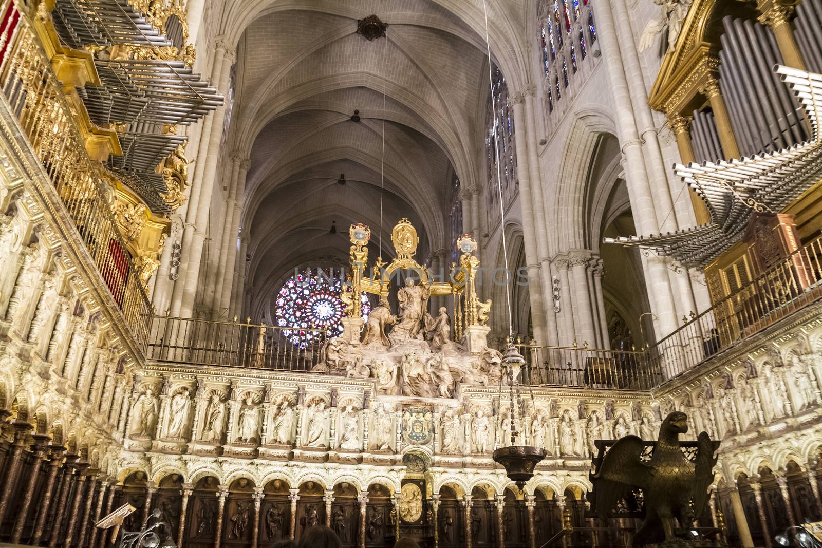 Interior of Toledo Cathedral. Arcs, organ, columns and gothic art. Spain