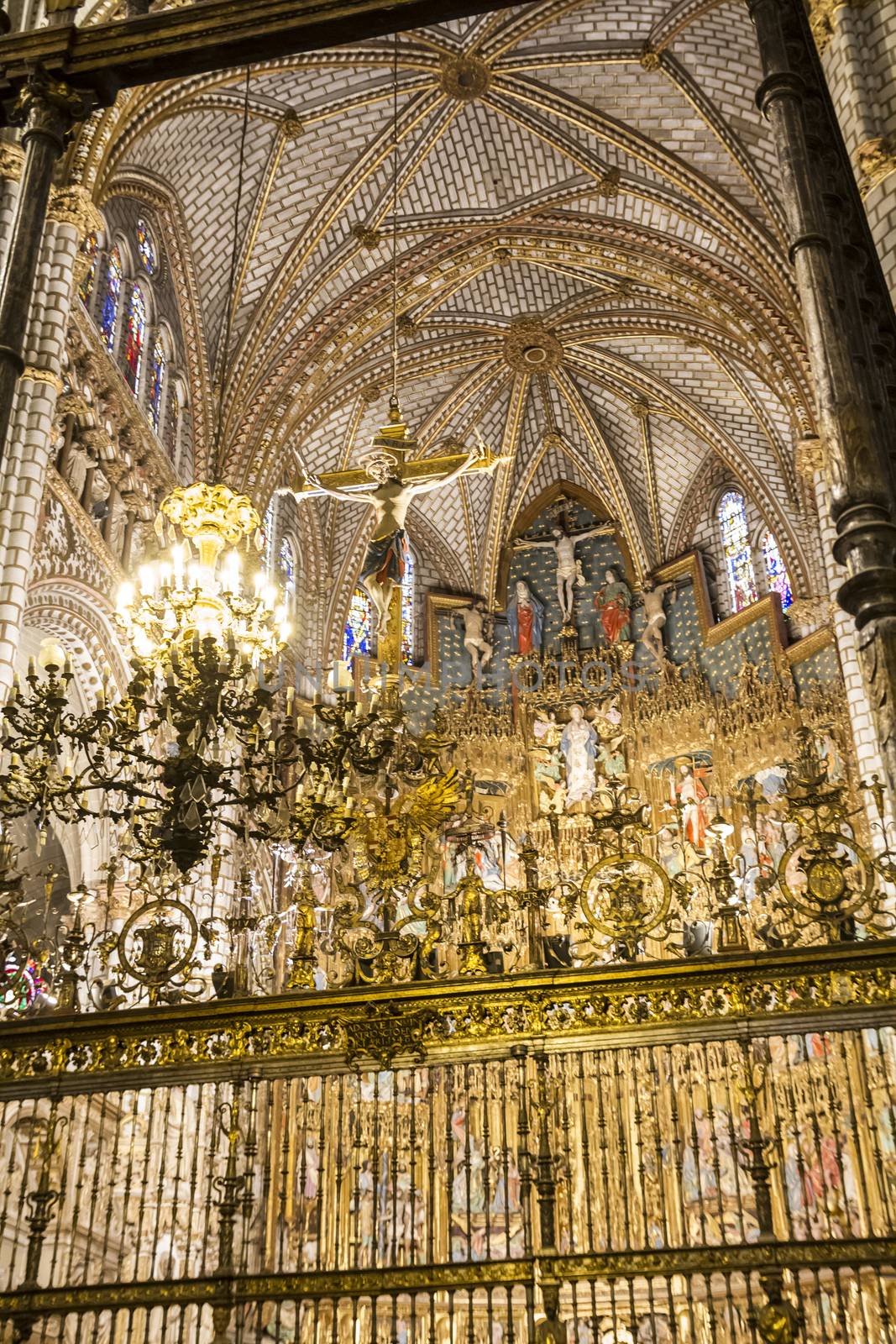 Interior of Toledo Cathedral. Arcs, organ, columns and gothic art. Spain