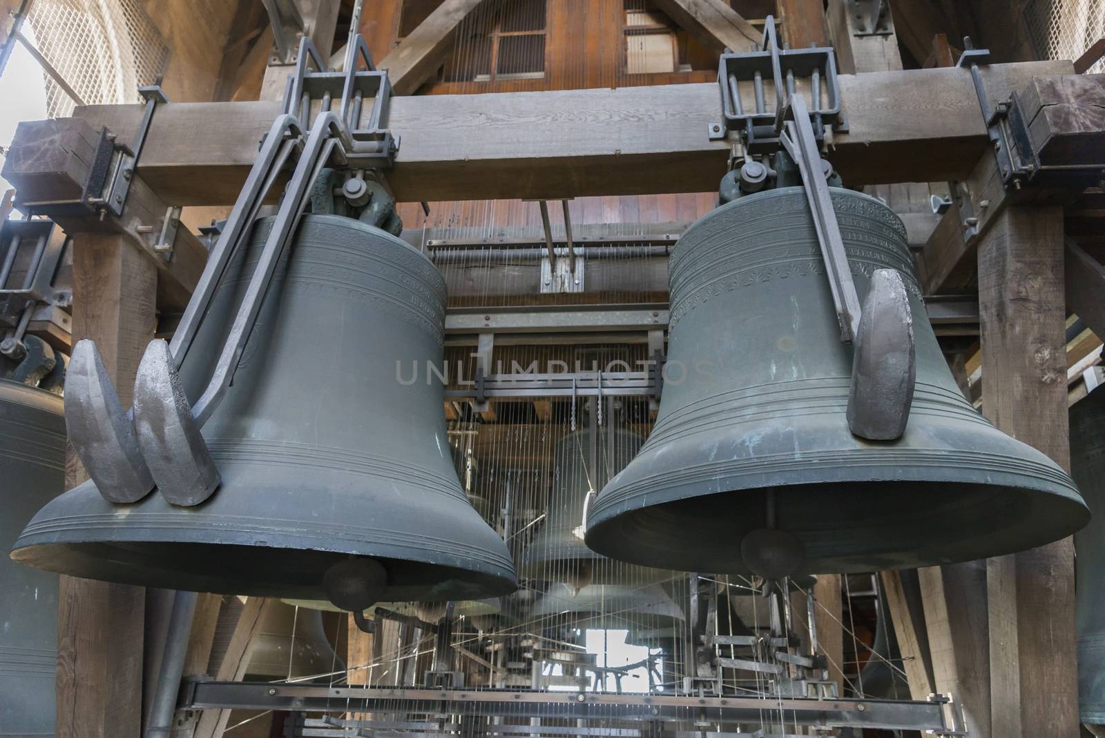 Two heavy bells at the carillon of Ghent Belfry. by Claudine