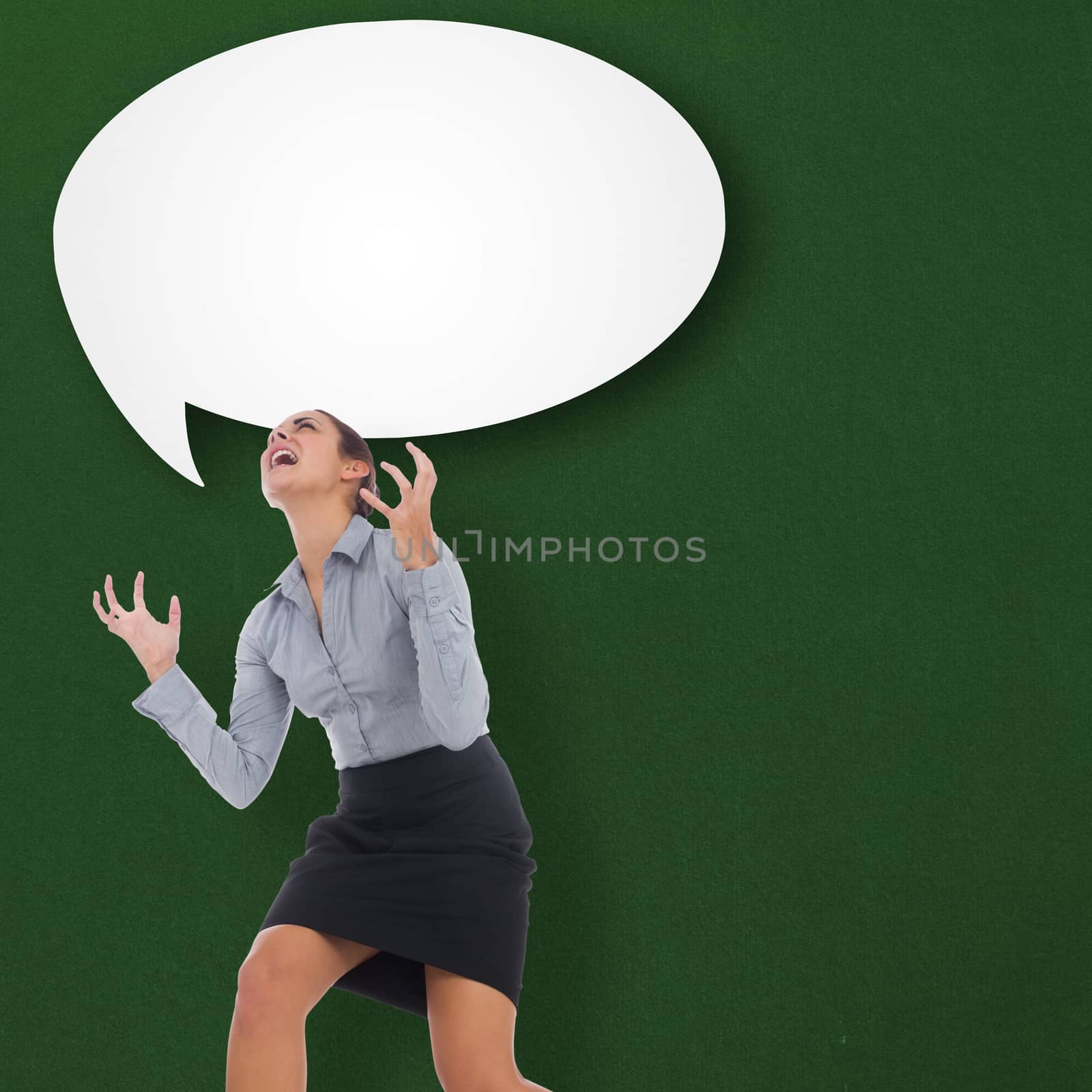 Furious businesswoman gesturing against speech bubble