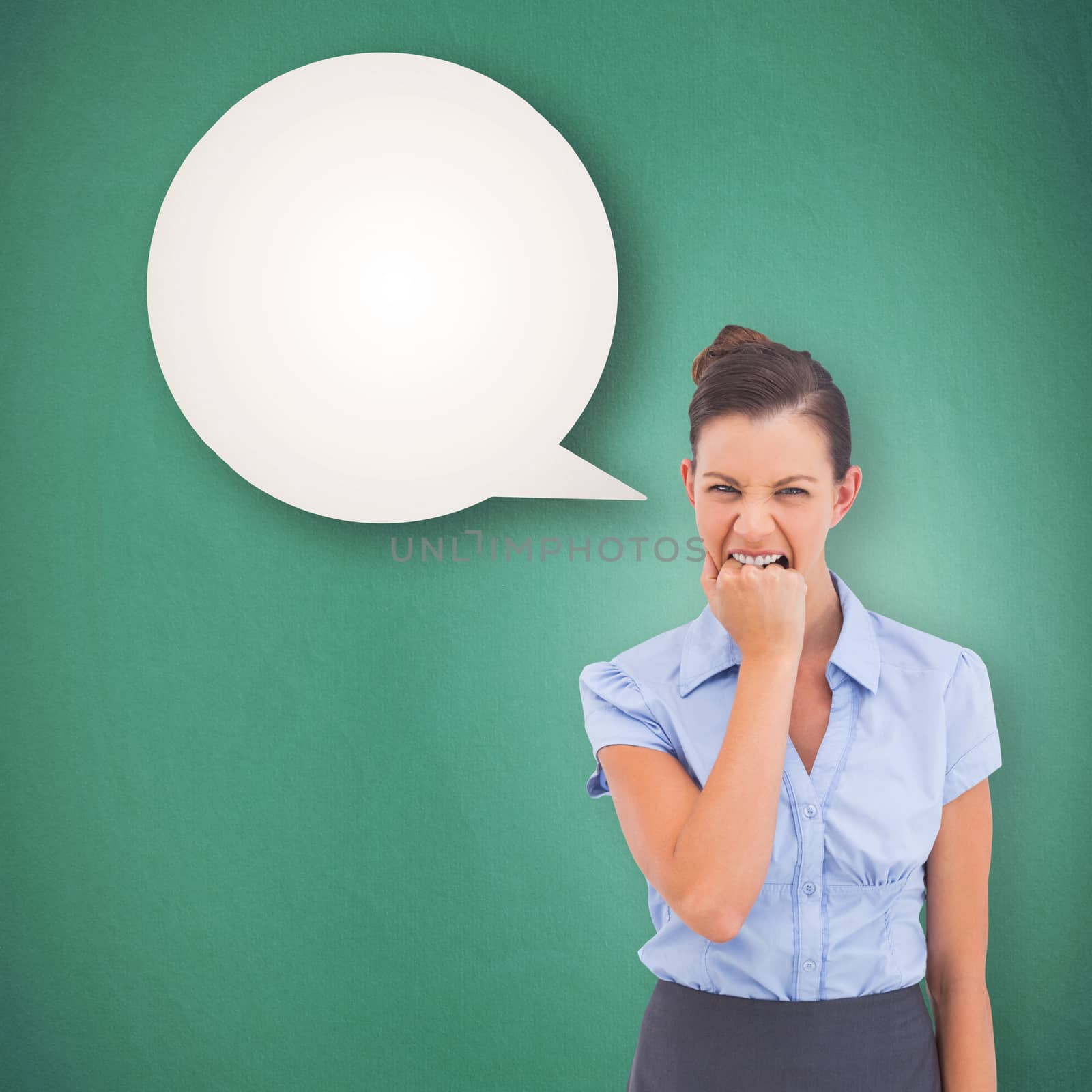 Composite image of furious businesswoman looking at the camera by Wavebreakmedia